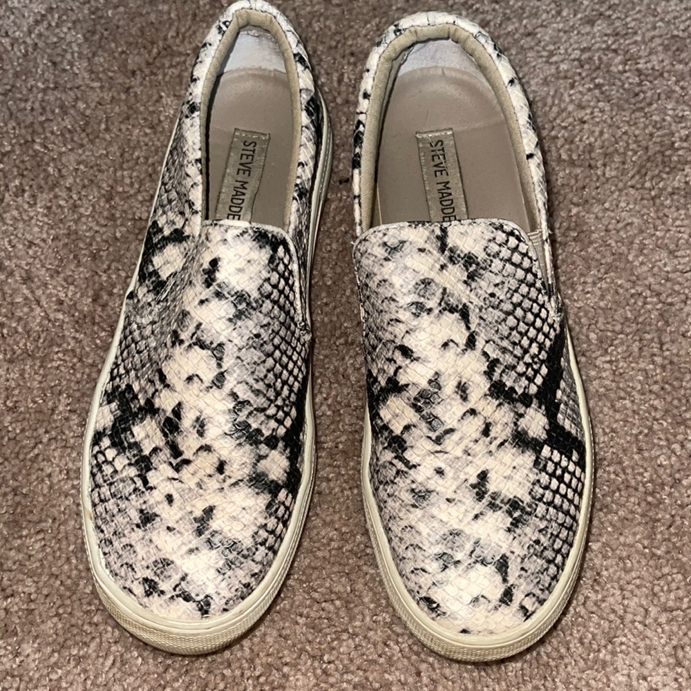 Steve Madden snake skin slip on shoes.